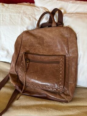 The Sak Distressed Brown Leather-Style Backpack with Studded Front Pocket